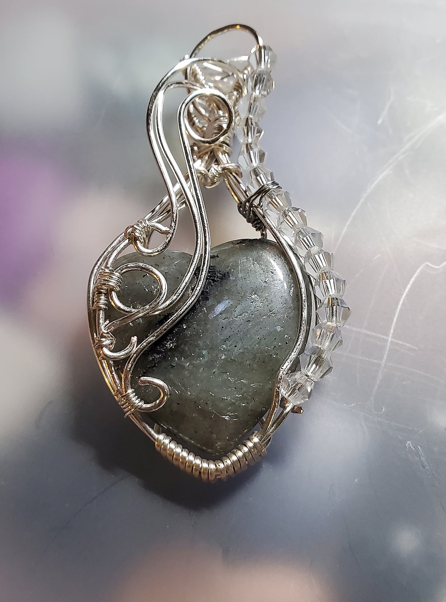 Wire wrapped heart stone. Hand designed.